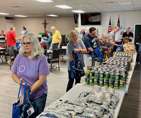 Pack food bags for families in need this Thanksgiving! Food supplies are gathered and packed for pickup to over 300 families around Estero Church.